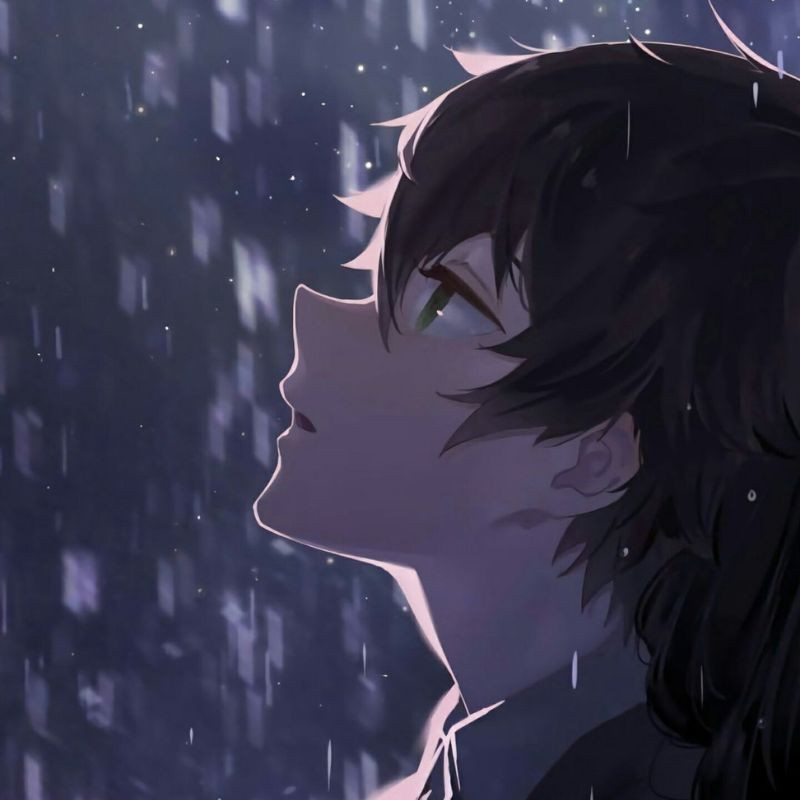 Nhân vật anime nam với ánh mắt buồn nhìn xa xăm