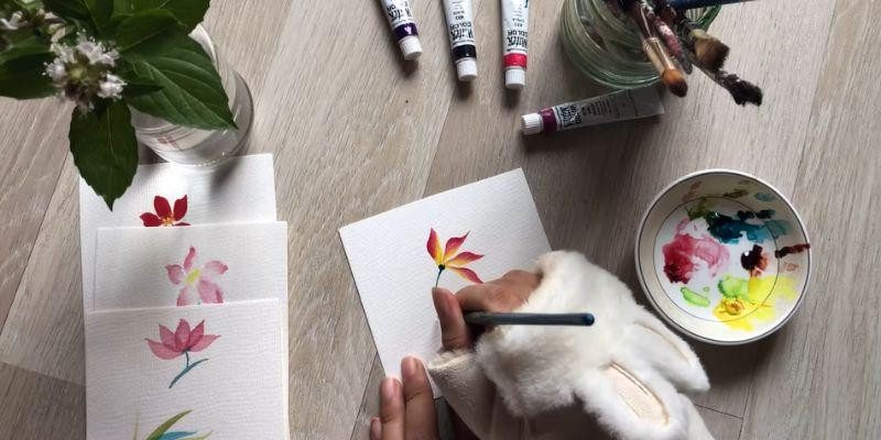 Minh họa các kỹ thuật vẽ màu nước cơ bản như wet-on-wet và dry brush cho người mới học vẽ